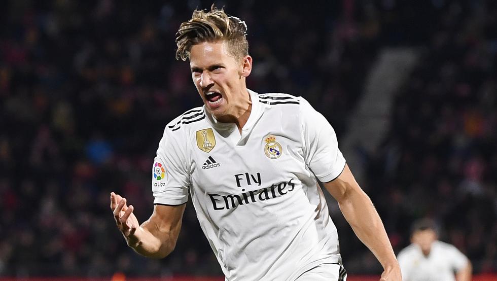 GIRONA, SPAIN - JANUARY 31: Marcos Llorente of Real Madrid celebrates scoring to make it 3-1 during the Copa del Quarter Final match between Girona and Real Madrid at Montilivi Stadium on January 31, 2019 in Girona, Spain. (Photo by David Ramos/Getty Images )