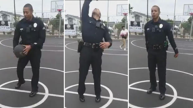 Viral y asombroso: oficial de policía encesta de espaldas en partido con varios niños