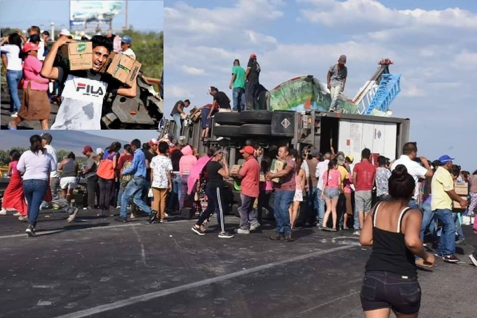 Rapiña en la autopista Querétaro- Celaya, saquean tráiler accidentado cargado con leche