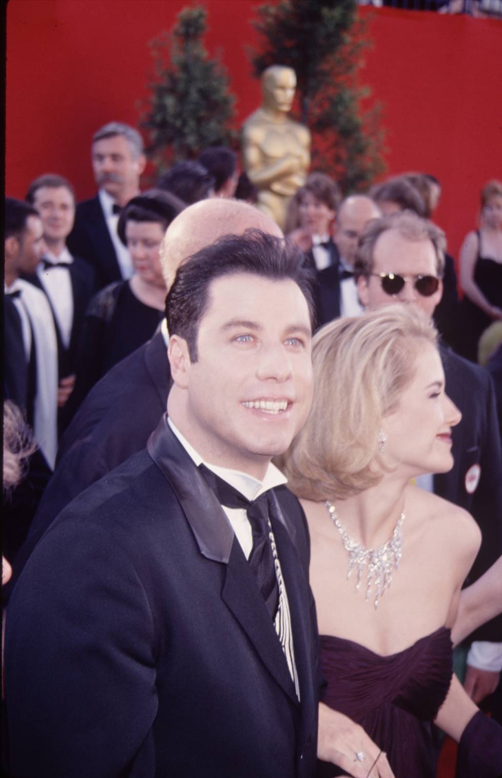En 1995, tras unos años de películas mal valoradas por la crítica y fracasos en taquilla, John Travolta estaba en lo más alto gracias a Pulp Fiction. En la imagen, junto a Kelly Preston en los Oscar de ese año, cuando estuvo nominado por el papel de Vincent Vega.