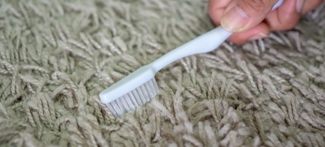 alfombra de limpieza de manos con cepillo de dientes