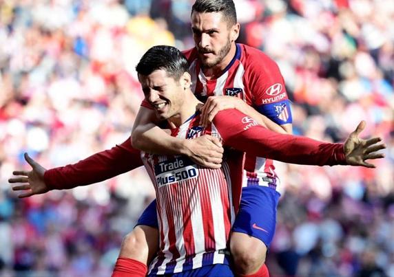 Morata y Koke celebran un gol con la camiseta del Atlético de Madrid