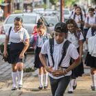 Students arrive to Rigoberto Lopez Perez public school, with very few wearing masks amid the spread of the new coronavirus, at the start of the school day in Managua, Nicaragua, Monday, April 27, 2020. (AP Photo/Alfredo Zuniga)