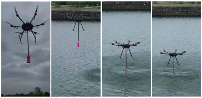 Un dron sumerge un recipiente de muestra en un río.