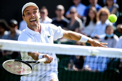 Wimbledon (United Kingdom), 02/07/2021.- Roberto Bautista Agut of Spain in action against Dominik Koepfer of Germany during the 3rd round match at the Wimbledon Championships tennis tournament in Wimbledon, Britain, 02 July 2021. (Tenis, Alemania, España, Reino Unido) EFE/EPA/FACUNDO ARRIZABALAGA EDITORIAL USE ONLY