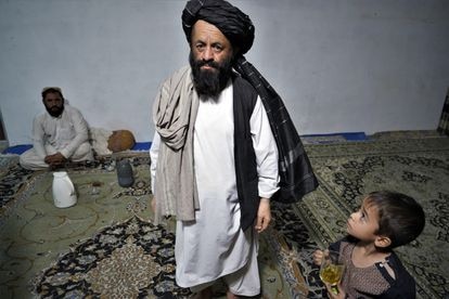 Qari Gul Mohammed, empresario de Kandahar que medió entre las autoridades depuestas y los talibanes.                              