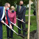 German Chancellor Angela Merkel, The Major of Templin Detlef Tabbert and Franz-Christoph Michel take part in a tree planting event during the 750th city anniversary celebrations in Burgergarten, in Templin, Germany September 10, 2021.  REUTERS/Annegret Hilse