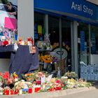 Flowers are placed in front of a gas station in Idar-Oberstein, Germany, September 21, 2021, after a 20-year-old gas station attendant who asked a customer to wear a face mask was shot dead last Saturday, September 18, 2021.     REUTERS/Annkathrin Weiss
