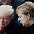 (FILES) In this file photo taken on November 11, 2018 then US President Donald Trump (L) and German Chancellor Angela Merkel (R) speak as they attend a ceremony at the Arc de Triomphe in Paris as part of commemorations marking the 100th anniversary of the 11 November 1918 armistice, ending World War I. - Germany heads into an election on September 26, 2021, the most suspenseful vote in a generation in Europe's biggest economy that will see Chancellor Angela Merkel step down after 16 years in power. (Photo by Francois Mori / POOL / AFP)