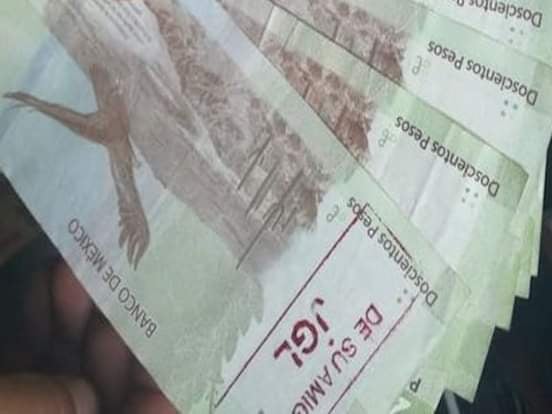 Aparecen billetes de a 200 pesos con las iniciales de Joaquín “El Chapo” Guzmán