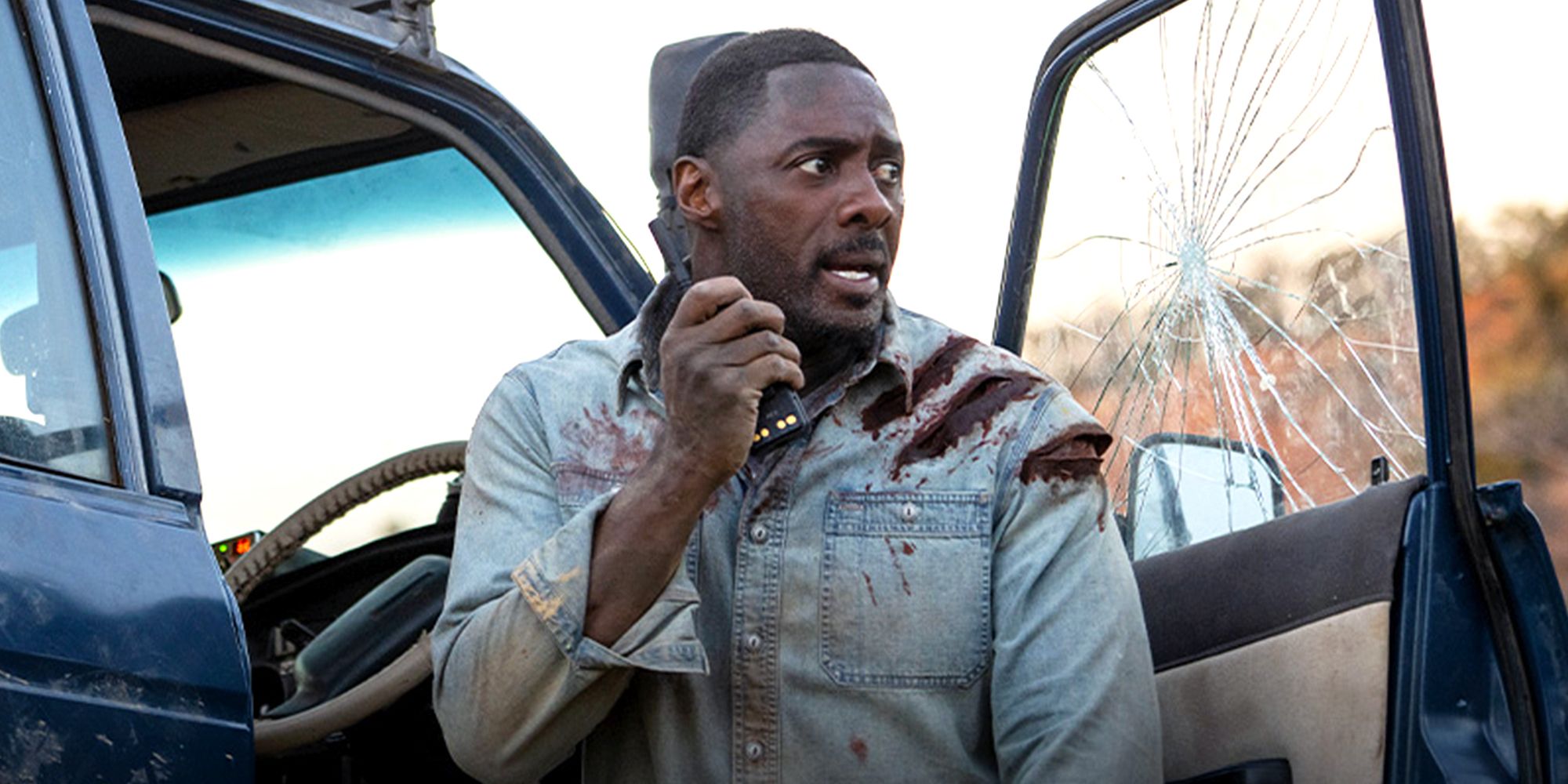 Idris Elba teme a un león sediento de sangre en New Beast Movie Image
