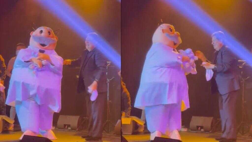 Botarga de Dr. Simi aparece durante concierto de Coque Muñiz y arroja peluches al público