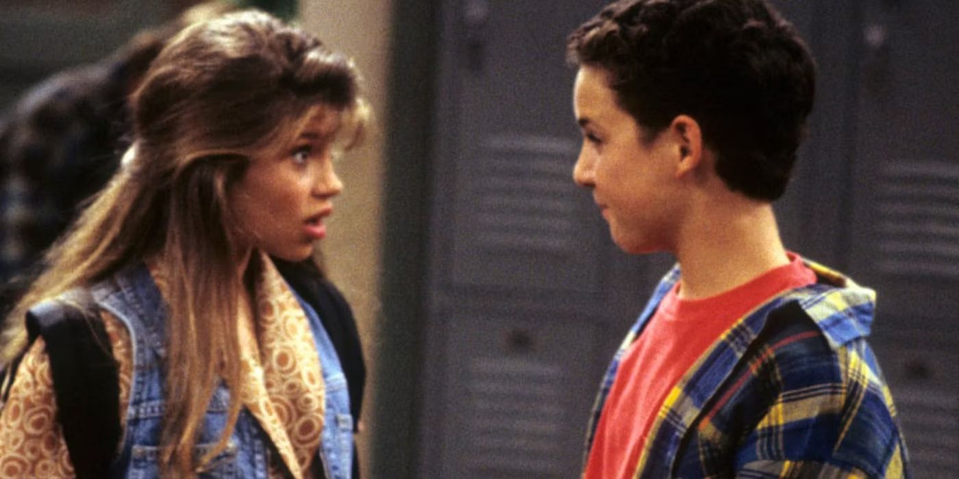 Topanga and Cory in Boy Meets World talking at school