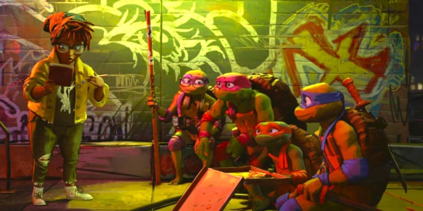 Teenage Mutant Ninja Turtles Mutant Mayhem still featuring April O'Neill standing while the Turtles look at her