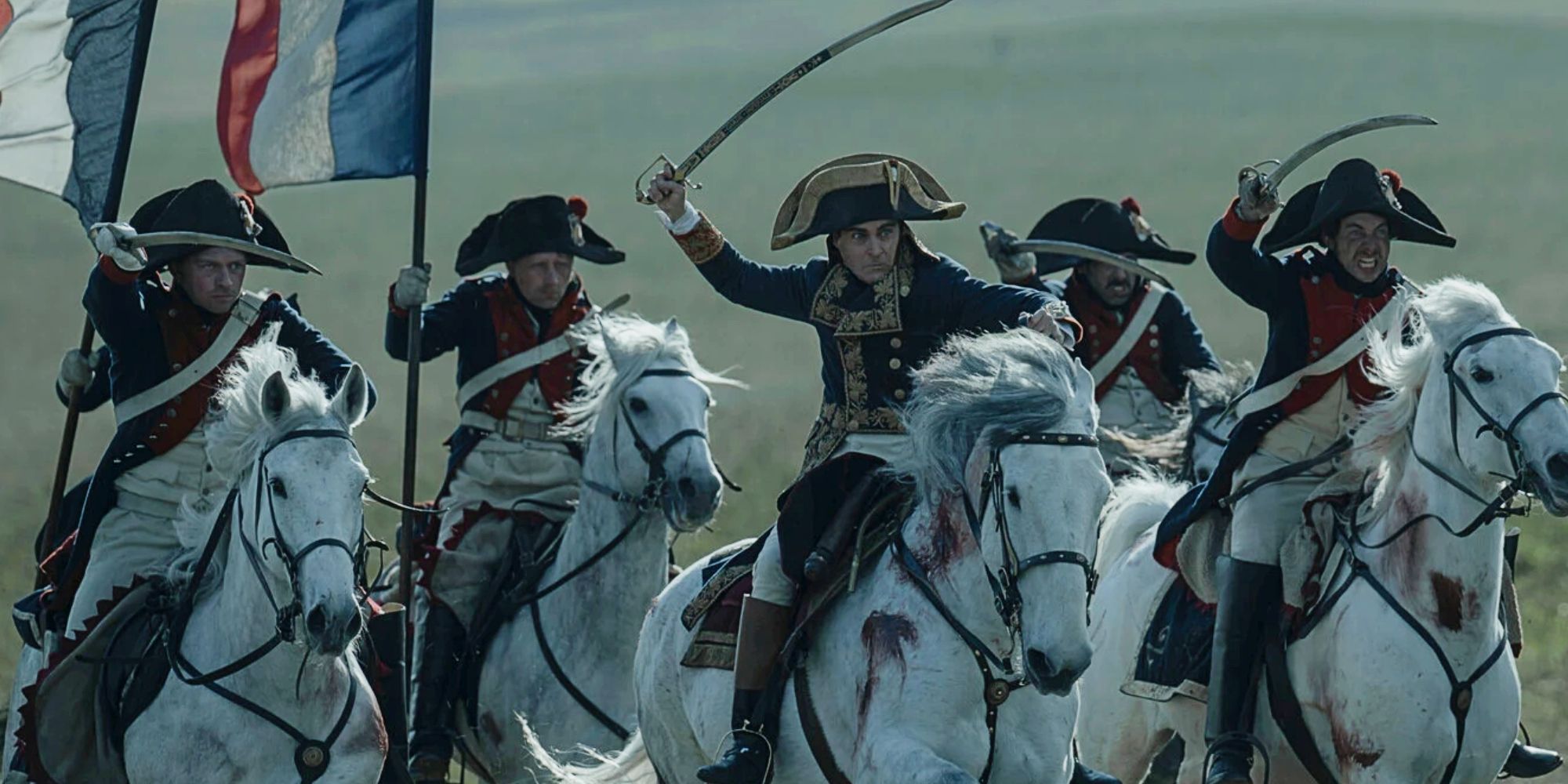 Joaquin Phoenix charging into battle as Napoleon