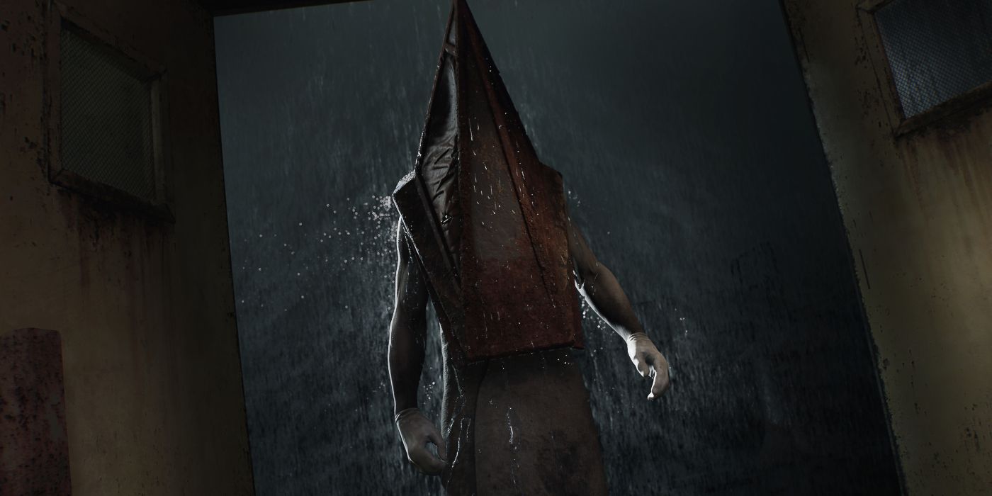 The classic enemy from Silent Hill 2, Pyramid Head, standing in the rain.