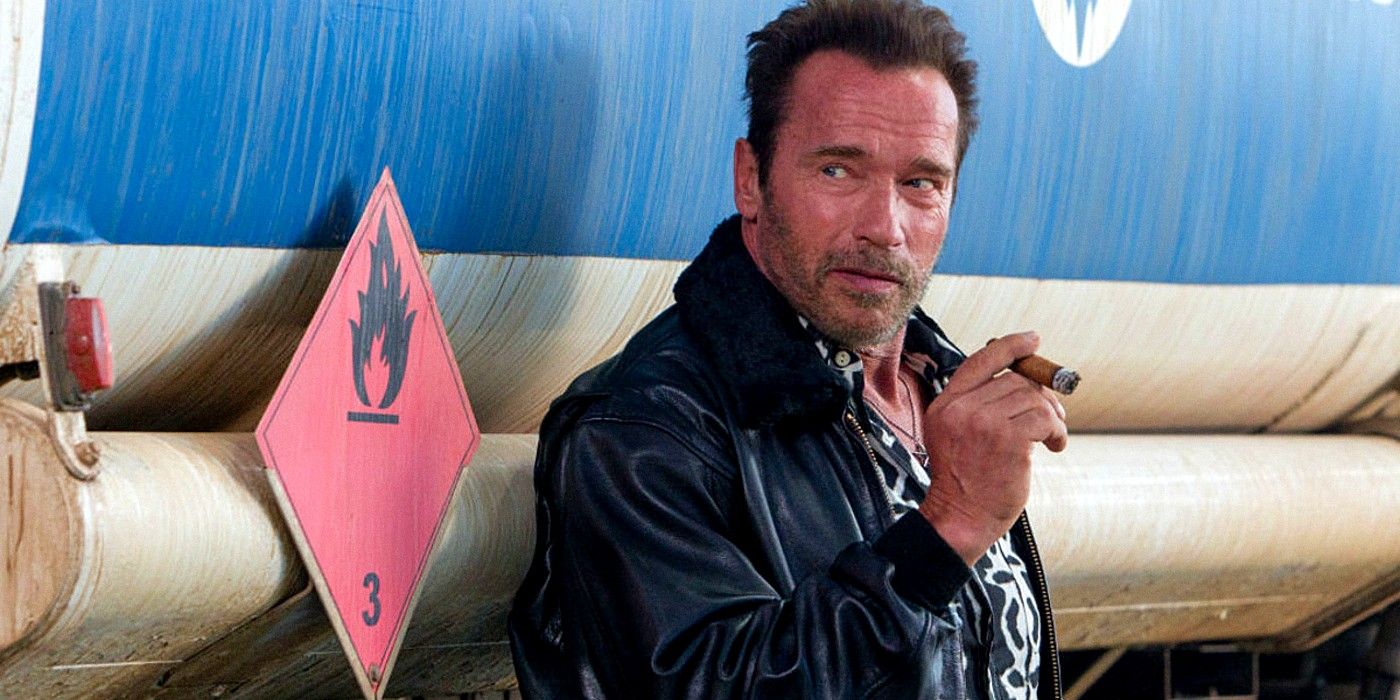 Arnold-Schwarzenegger in Expendables 4 smoking a cigar and leaning against a plane