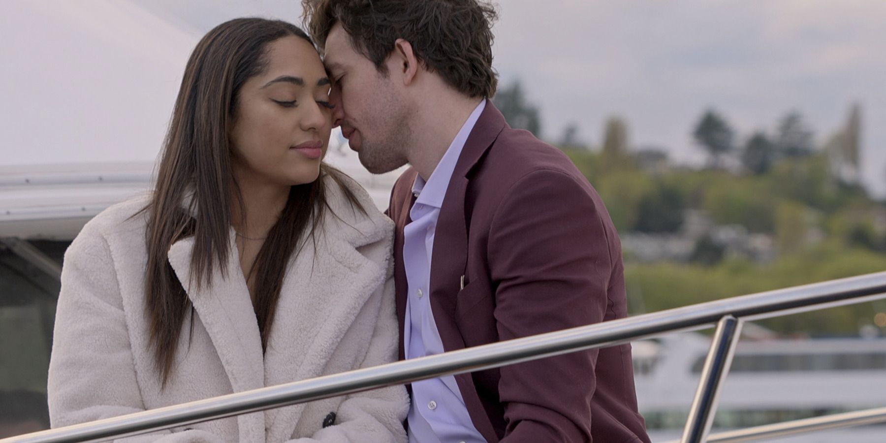 Love is Blind season 4 stars Bliss Poureetezadi and Zack Goytowski on a boat
