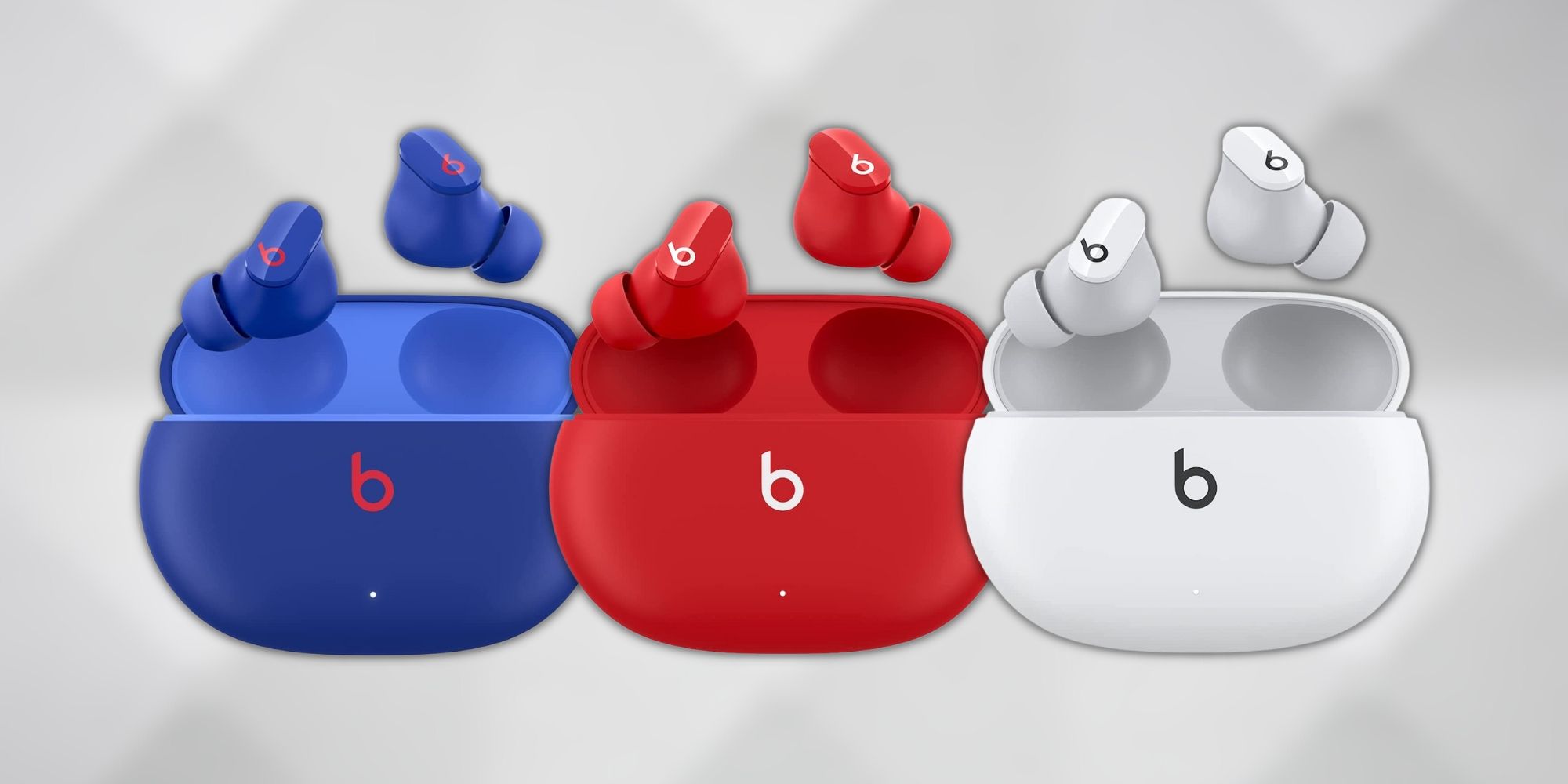 Image of the Beats Studio Buds in three colors including blue, red, and white