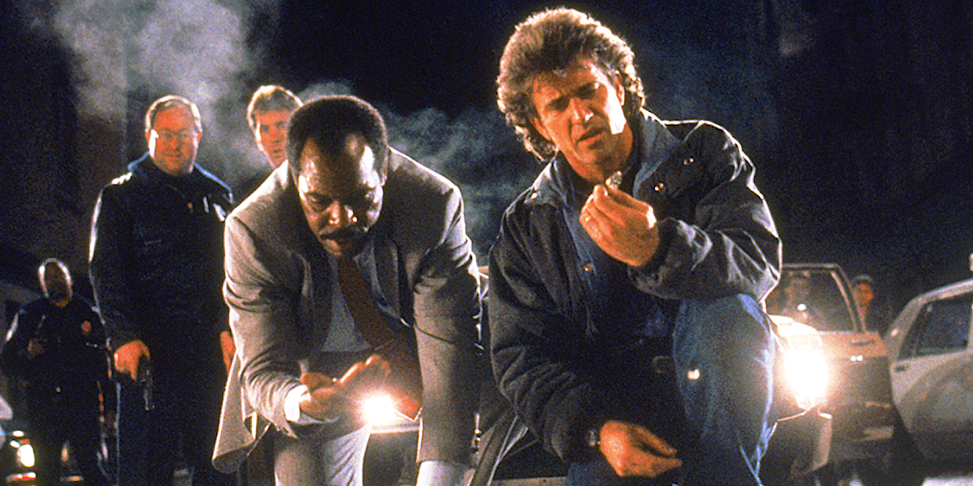 Riggs and Murtaugh inspect a crime scene in Lethal Weapon 2