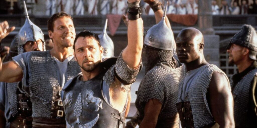 Russell Crowe and Djimon Hounsou in the original Gladiator celebrating a victory in the arena