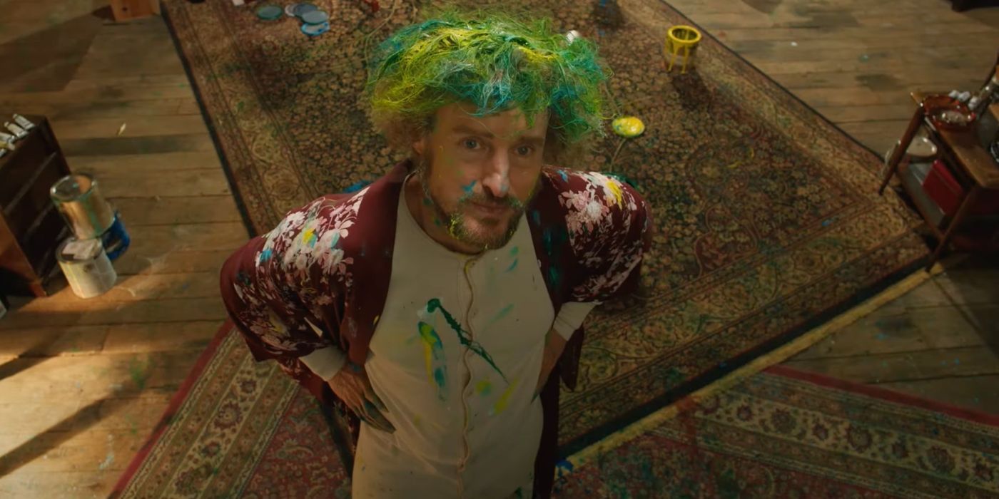 Owen Wilson as Carl Nargle covered in paint.