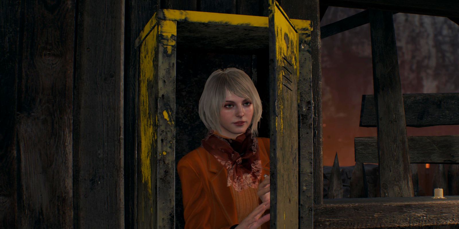 Ashley from Resident Evil 4 hiding in a storage locker