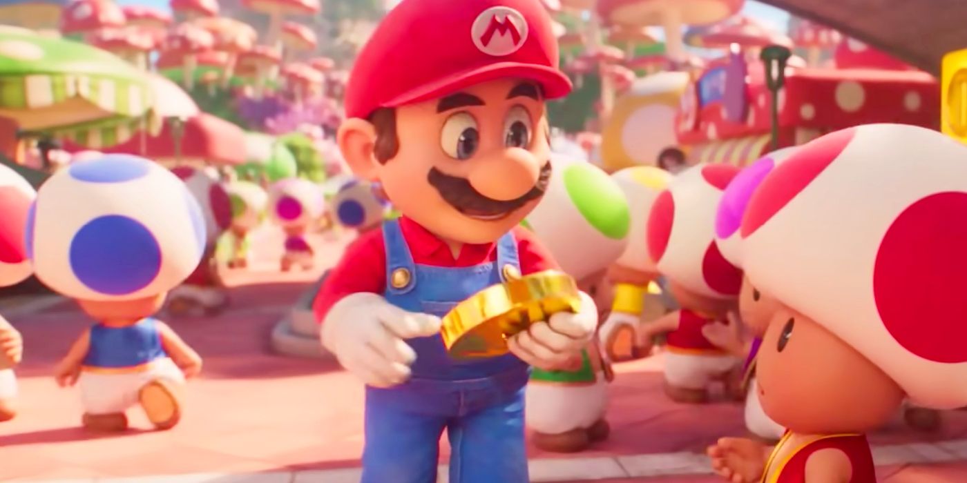 Mario holding a gold coin in The Super Mario Bros. Movie.