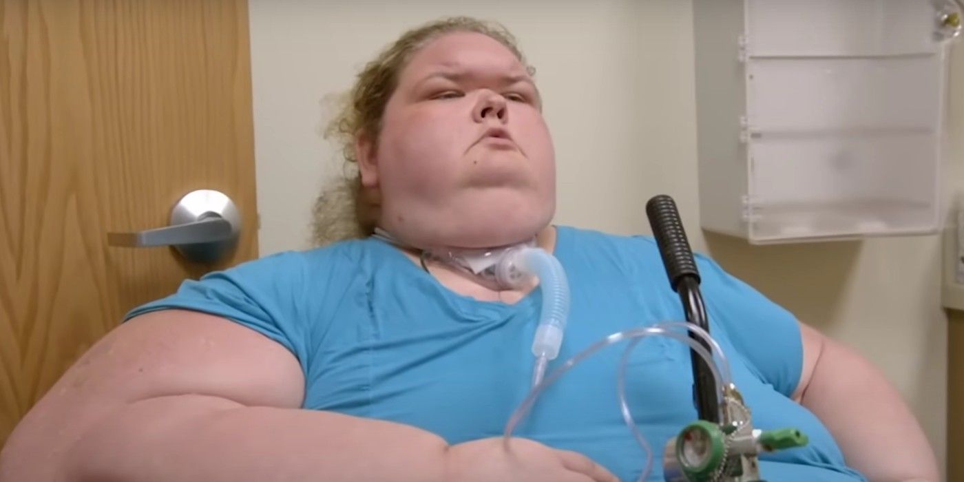 Tammy Slaton from 1000-lb Sisters wearing blue t-shirt with trach tube