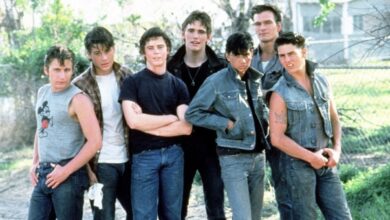 The cast of the Outsiders pose for a promo image