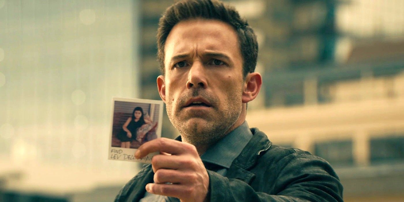 Ben Affleck as a detective holding up a picture of his missing daughter in Hypnotic