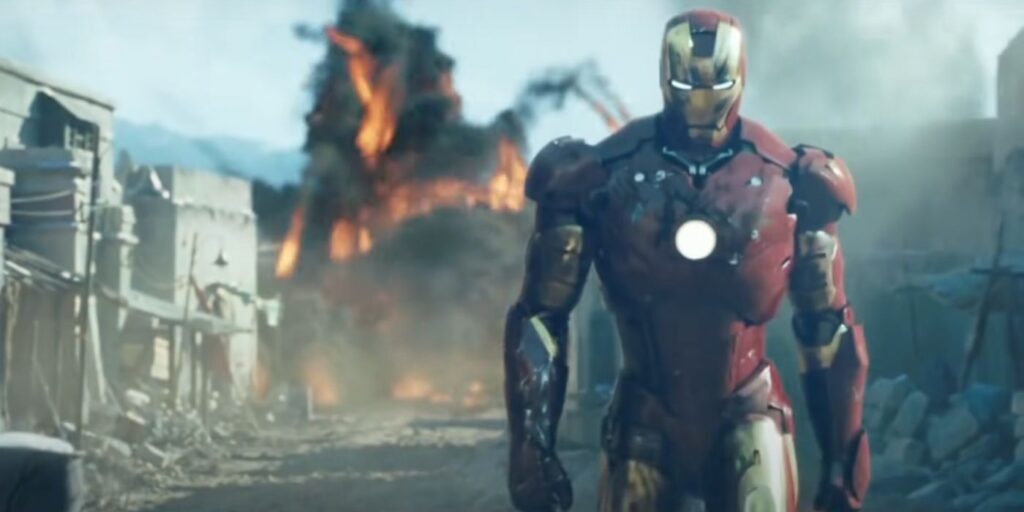 Iron Man walking away from an explosion