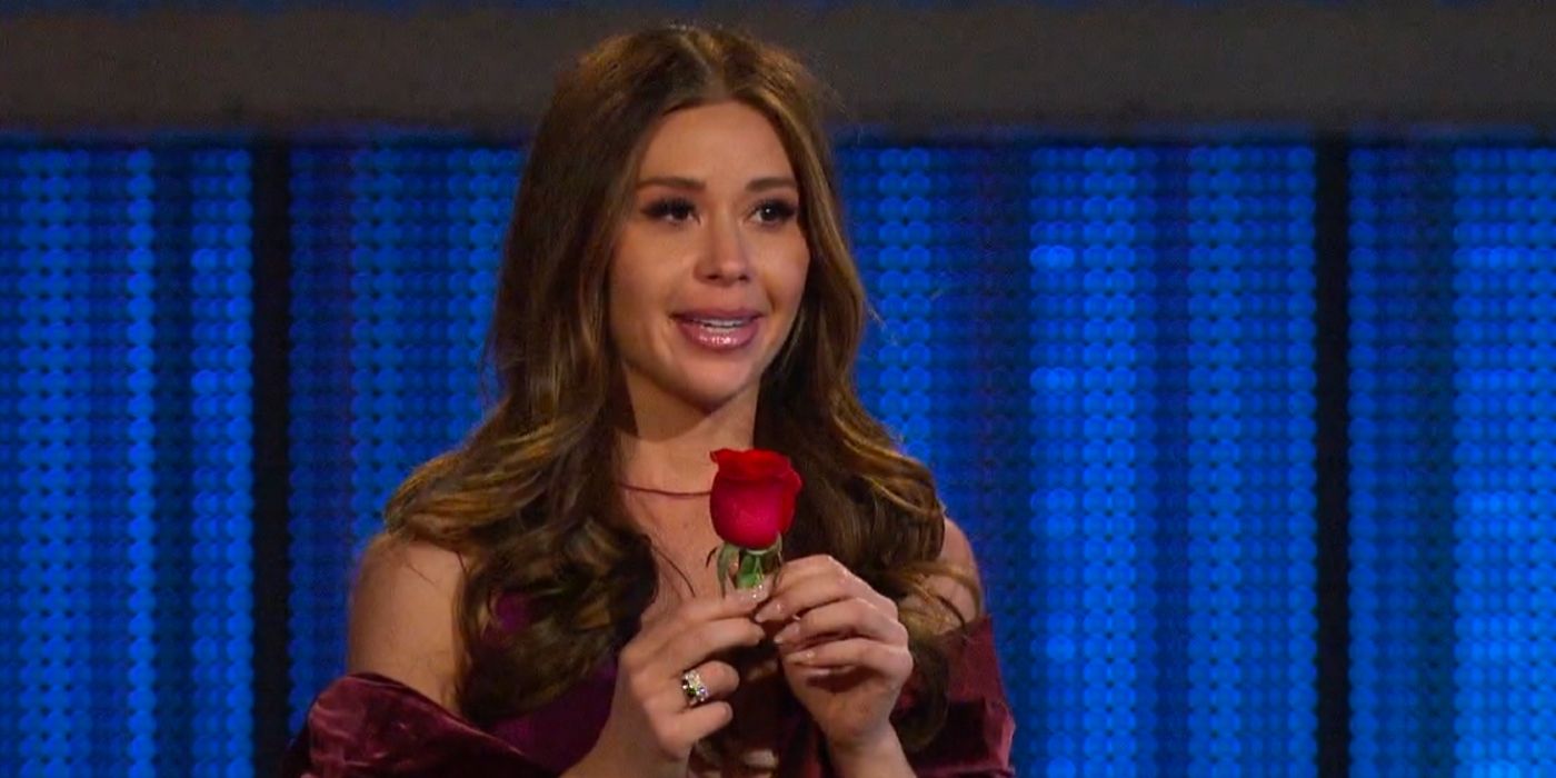 Gabby Windey handing out a rose on The Bachelorette