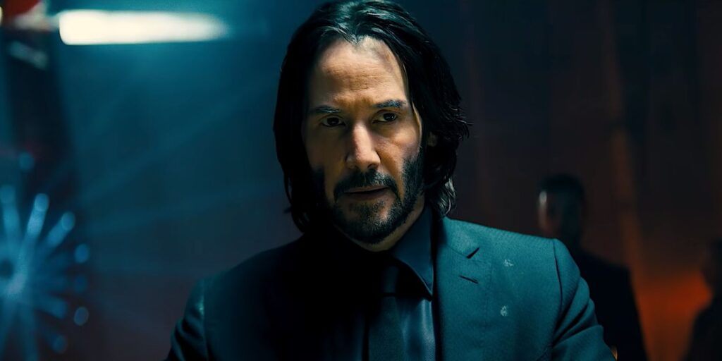 Keanu Reeves in John Wick Chapter 4 wearing black suit