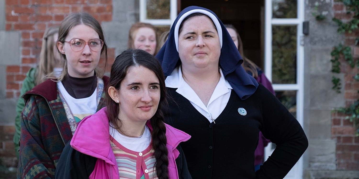 Aisling and jenny stand with Sister Michael in Derry Girls