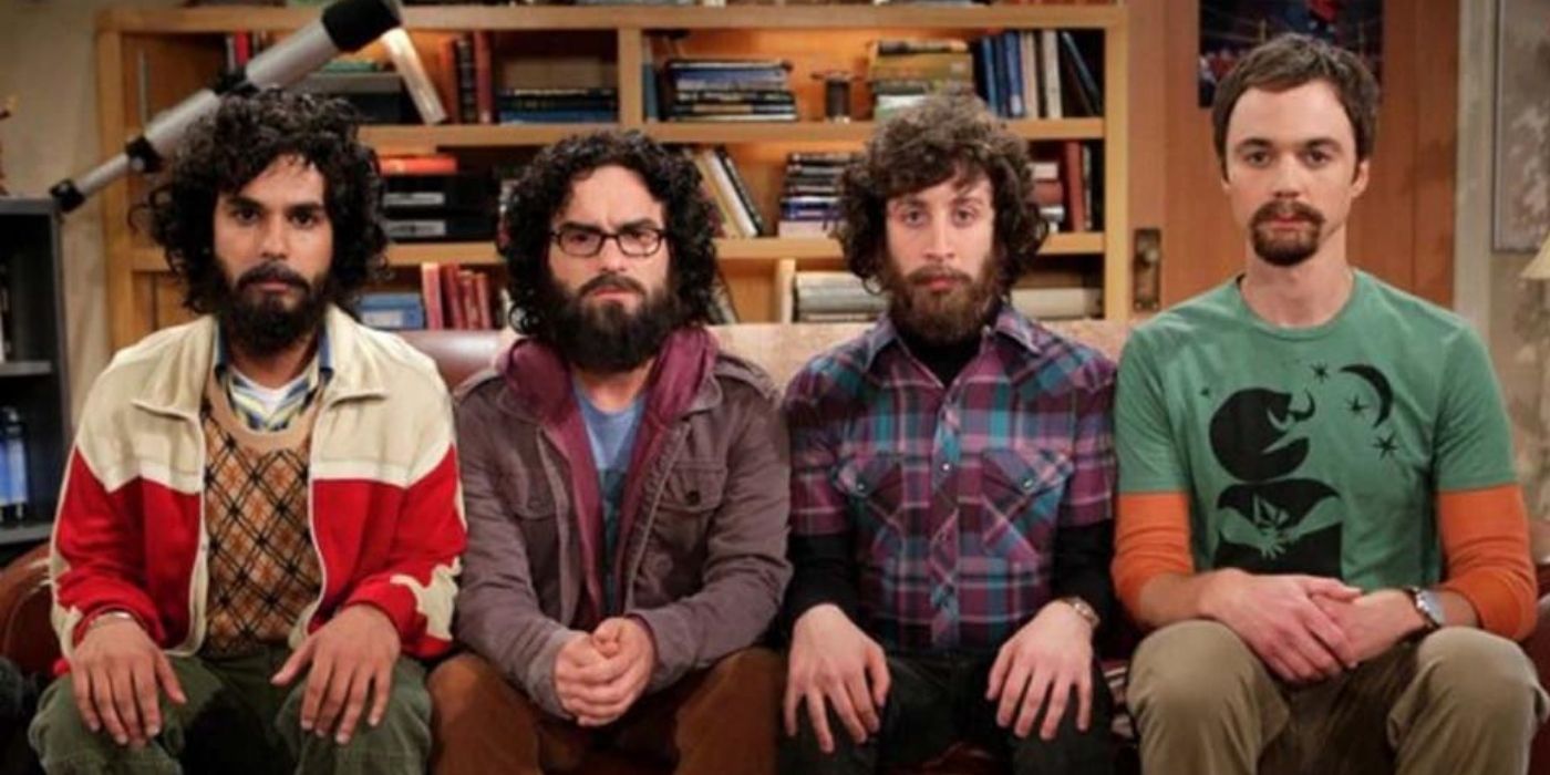 The Big Bang Theory Raj, Leonard, Howard and Sheldon all with beards sitting side by side after their North Pole Expedition