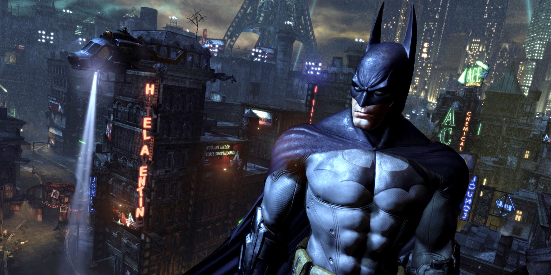 Batman standing in front of the Arkham City skyline.