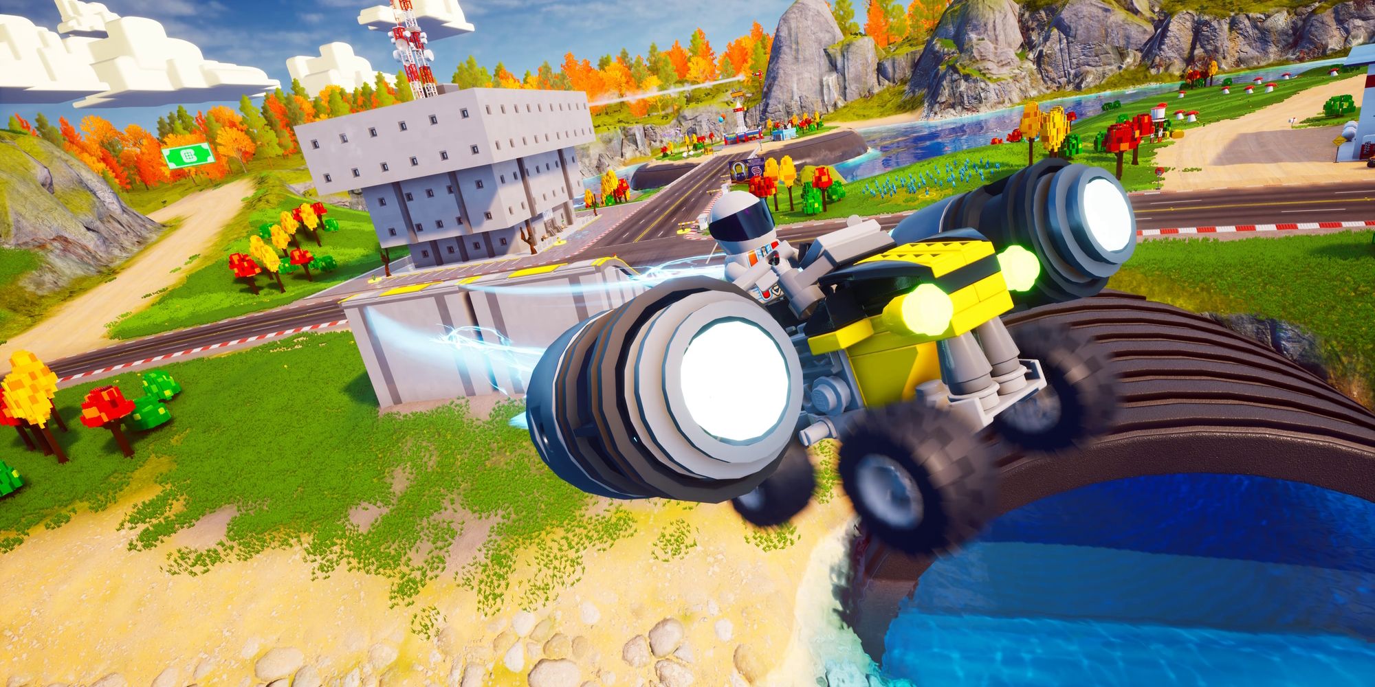 LEGO 2K Drive - A LEGO character driving an off road vehicle jumping off a ramp