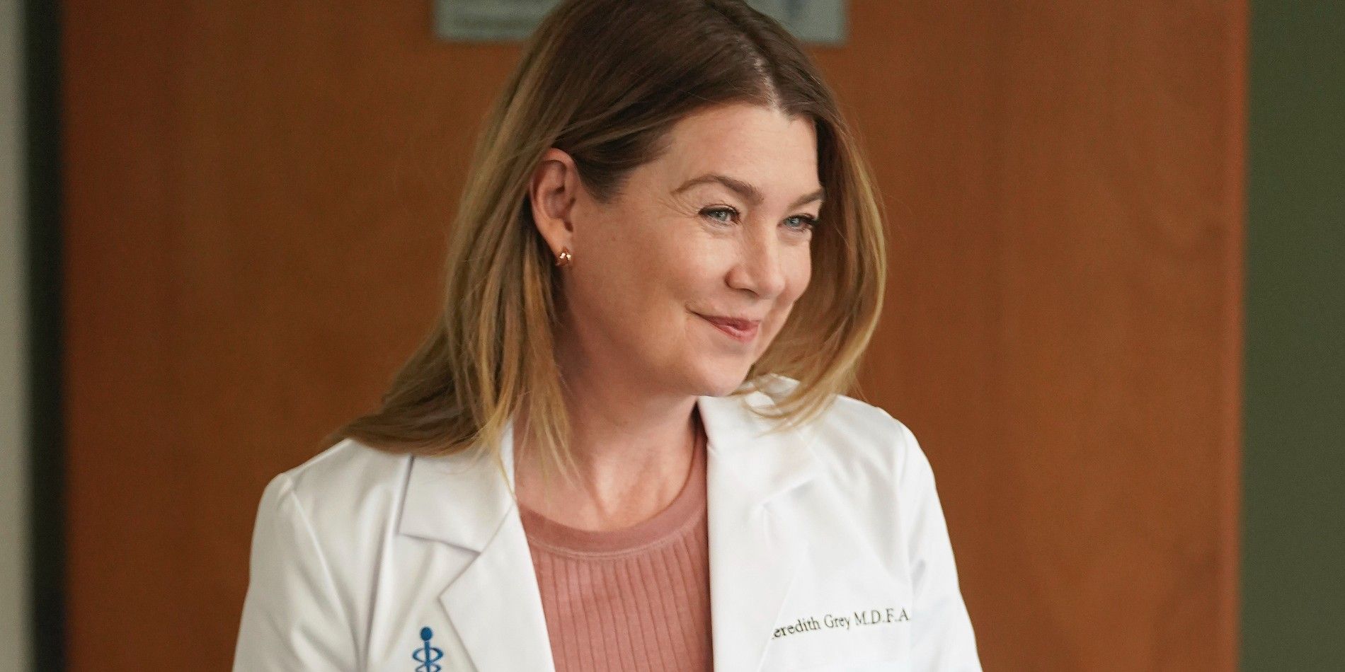 Ellen Pompeo as Meredith smiling on Grey's Anatomy