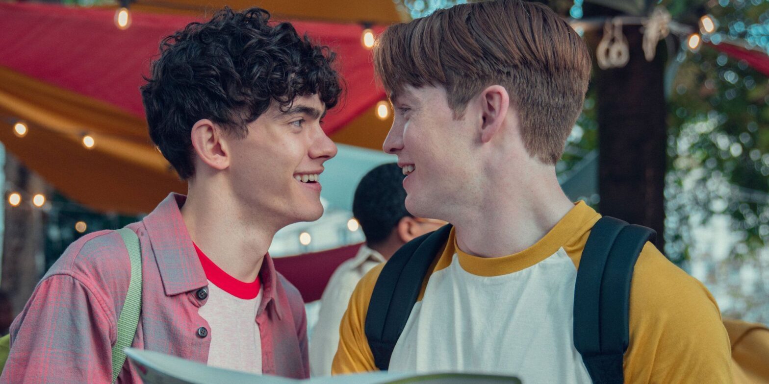 Joe Locke as Charlie Spring and Kit Connor as Nick Nelson Looking At Each Other in Paris in Heartstopper Season 2