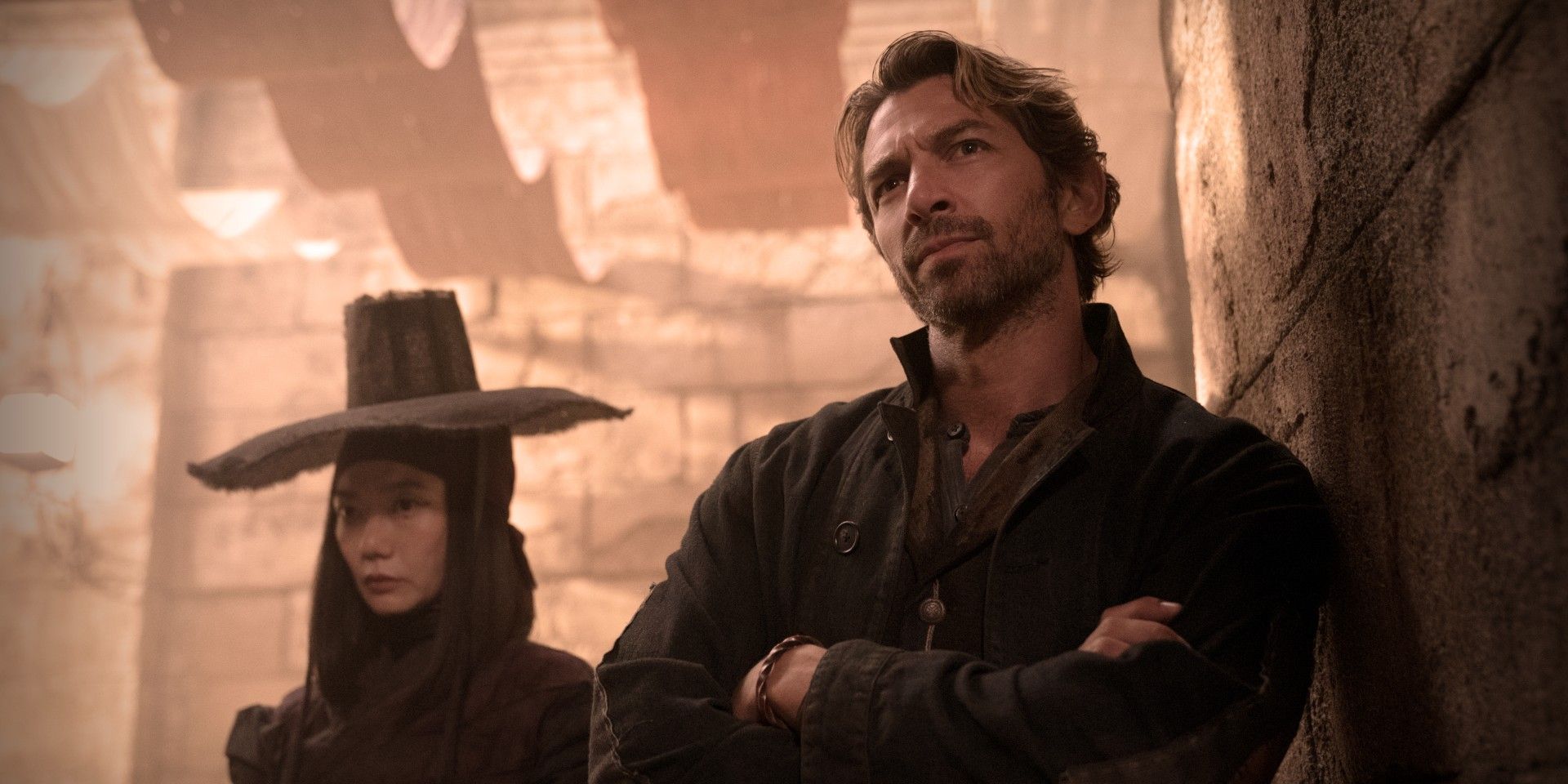 Bae Doona and Michiel Huisman in Rebel Moon - Part One: A Child of Fire