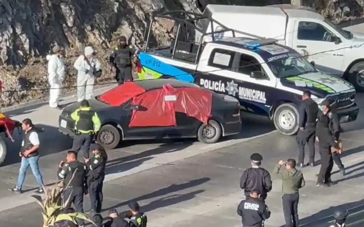 Había 7 cuerpos en auto abandonado en Periférico Ecológico: Fiscalía de Puebla