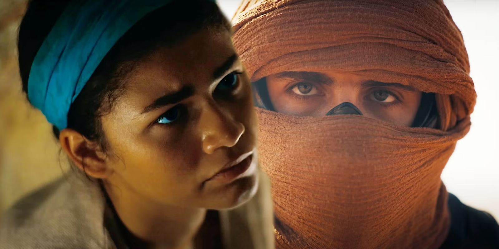 Zendaya como Chani mirando hacia arriba y Timothée Chalamet como Paul Atreides con la cabeza cubierta en Dune Part Two