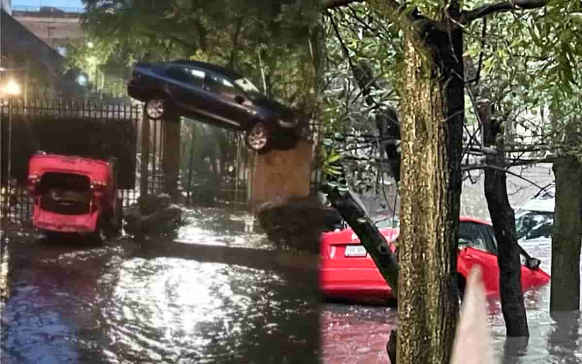 Video | ¿Cómo llegó ahí? Auto queda arriba de una reja por las fuertes lluvias en la Álvaro Obregón