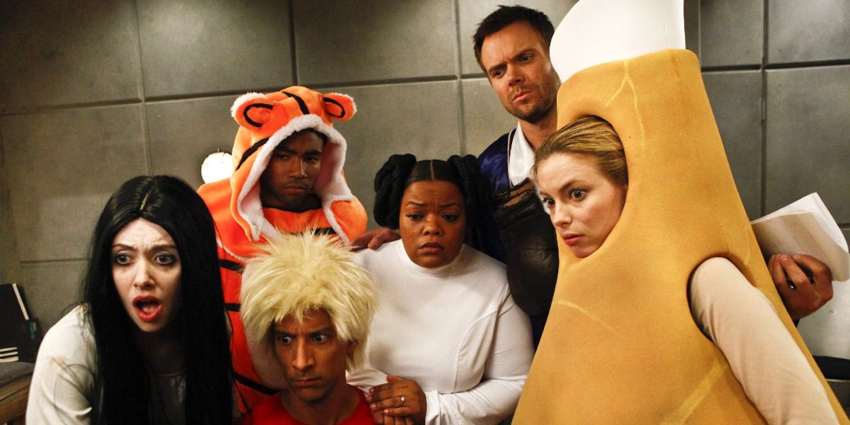 The Community cast looks distressed while wearing halloween outfits