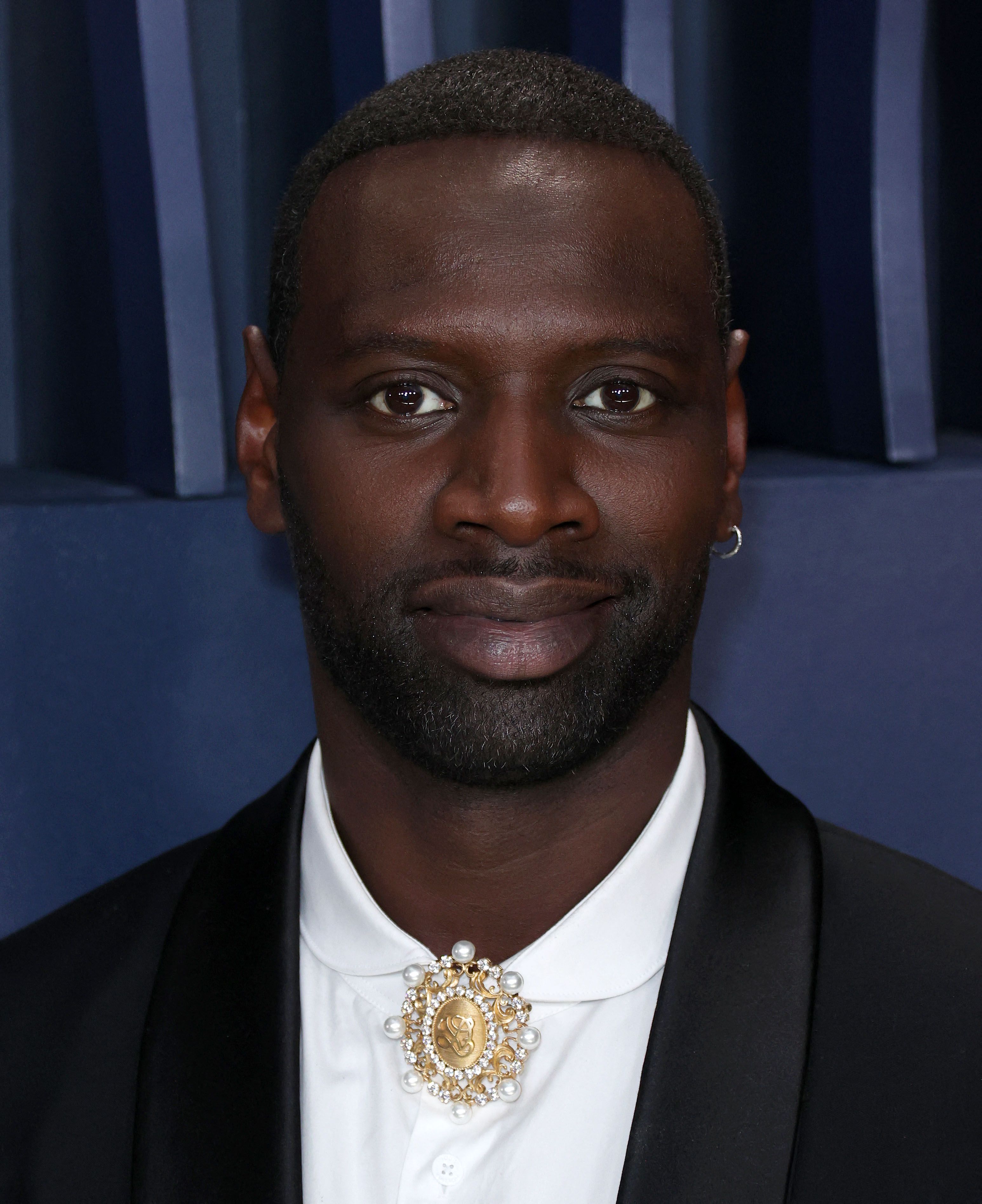 Moldada de la cabeza de Omar Sy en el 30 ° Premios anuales de Guild de Actores de Pantalla