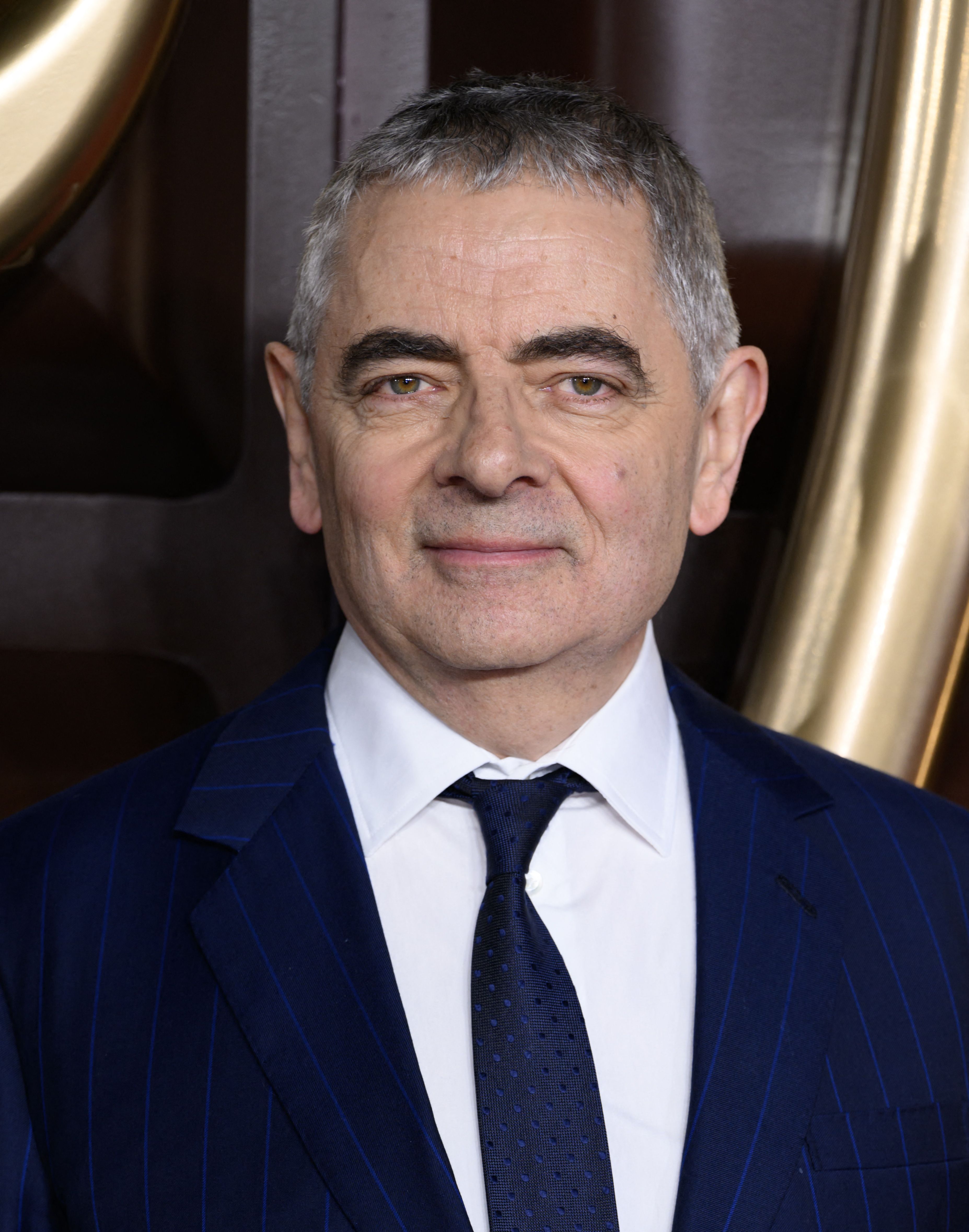 Tiro en la cabeza de Rowan Atkinson