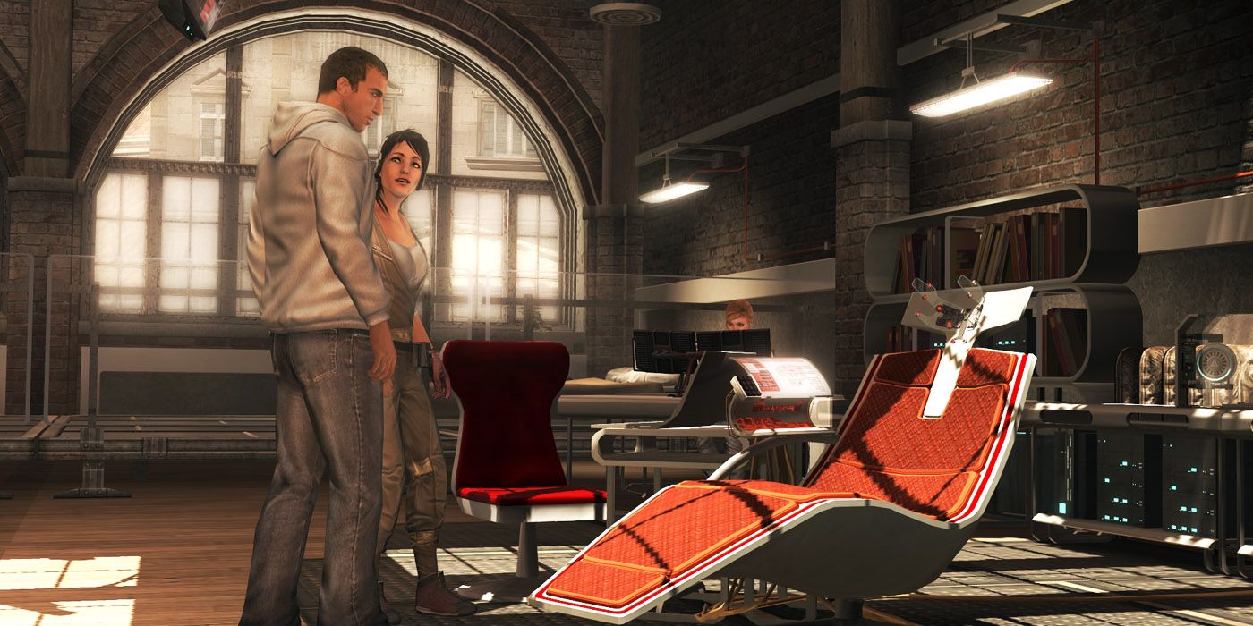 El ánimo en Assassin's Creed 2, con Desmond Miles hablando con Rebecca Crane frente al Animus 2.0.