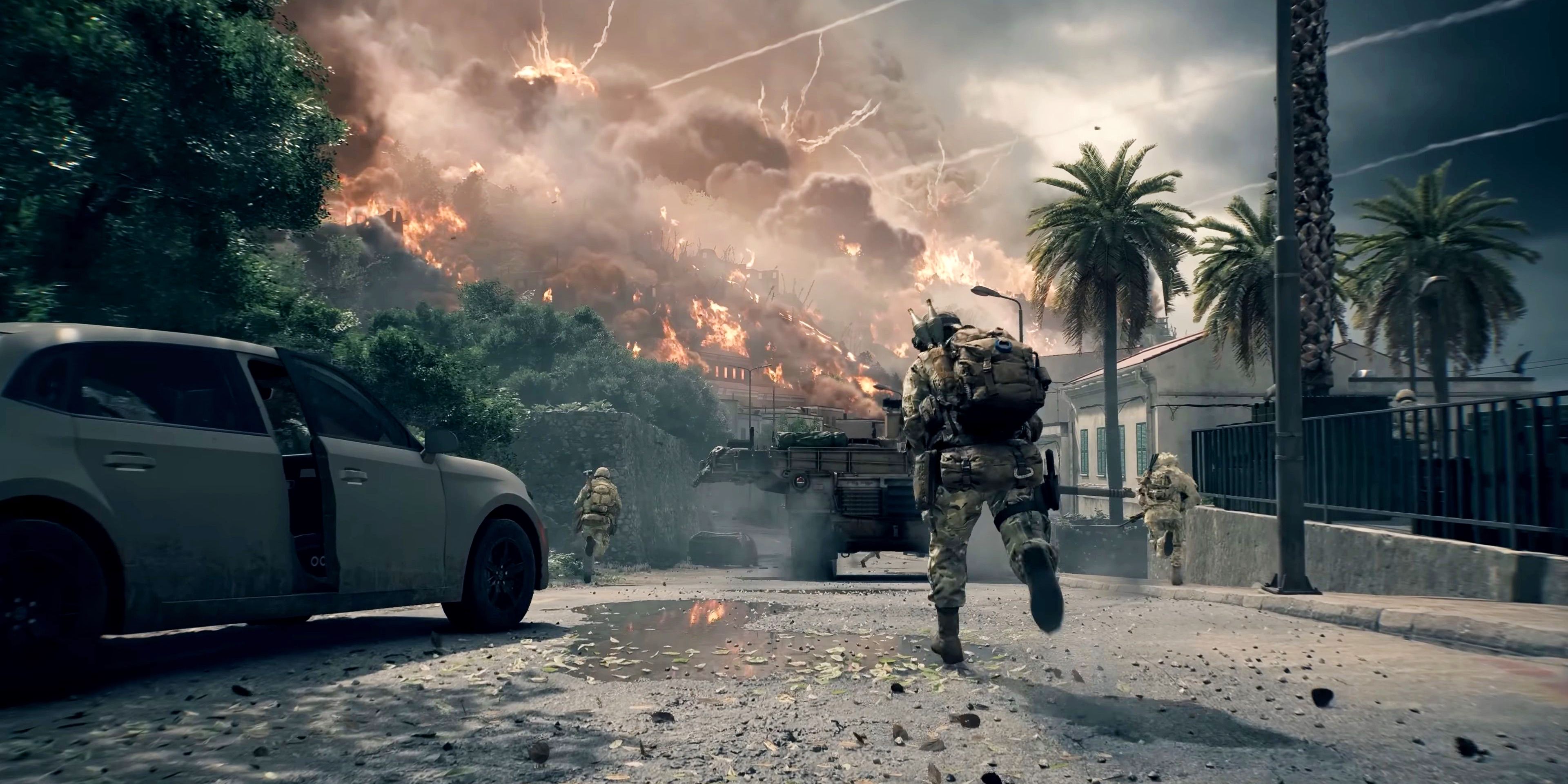 Battlefield 6 soldados corriendo por una calle con explosiones en la distancia.